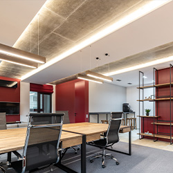 Photo by Max Vakhtbovych: https://www.pexels.com/photo/office-interior-with-table-and-chairs-near-shelves-6899401/